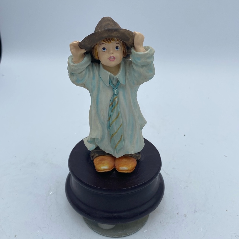 The San Francisco Music Company little boy playing dress up music box